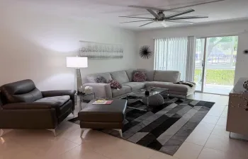 Lightfilled living room with a welcoming layout perfect for relaxing or hosting gatherings.