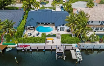 Gorgeous renovated deepwater home features metal roof, impact windows and customs upgrades throughout