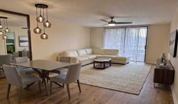 Digitally enhanced photo of Living Room. Virtually staged flooring, lighting and furniture.