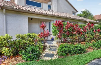 Welcome HOME! Sensational 2/2 model with 1,700SF and 2 car garage. Elevated living plus walk to houses of worship!