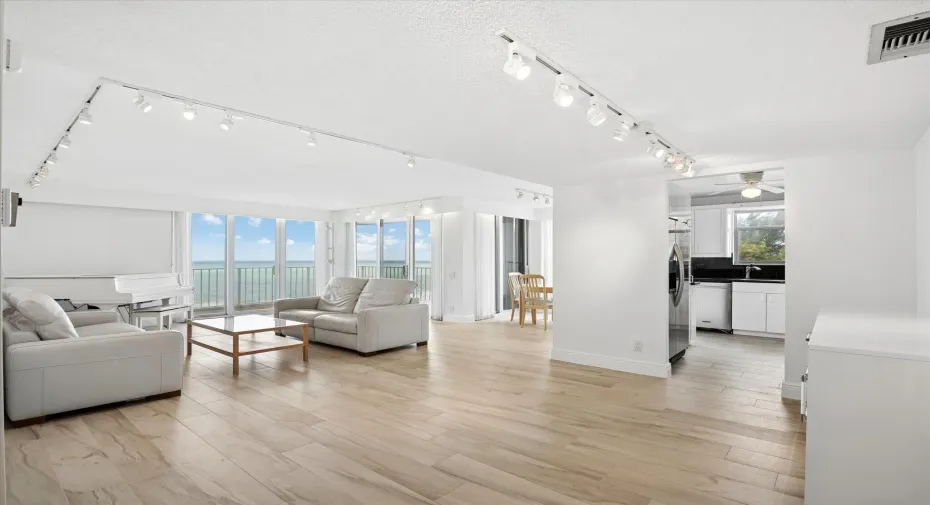 OCEANFRONT LIVING SPACE FRESHLY PAINTED WITH TILE FLOORING.