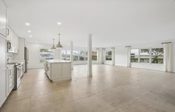 Generous open-concept layout with panoramic water views— 1,835 sq ft of living space provides flexibility for multiple dining, entertaining, or work-from-home configurations.