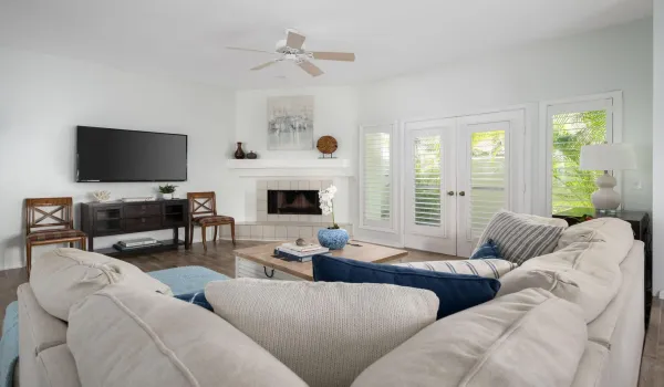 Living room with wood burning fireplace