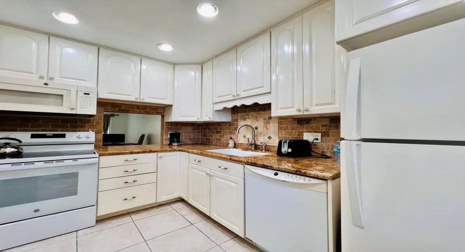 Lovely With Pretty & Peaceful Water & Preserve Views in 55+ Golden Lakes! Updated Kitchen & Baths! Pet Friendly Too (1 Pet - Max Weight 30lbs)