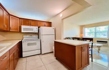 A Delightful Spot In 55+ Century Village! Darling FIRST FLOOR 1/1 With Updated Kitchen, Tile Flooring, and Impact Front Windows!