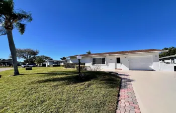 Delightful Easy One Floor Living with Golf Course Views in Gated Golf Course 55+ Community!