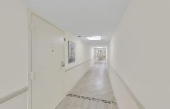 Completely covered entry from the parking garage.