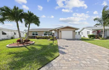 Cypress Lakes is an active adult community offering a wide range of amenities, including a clubhouse, pool, library, game room, card room, fitness center, shuffleboard, pickleball courts, and a putting green.