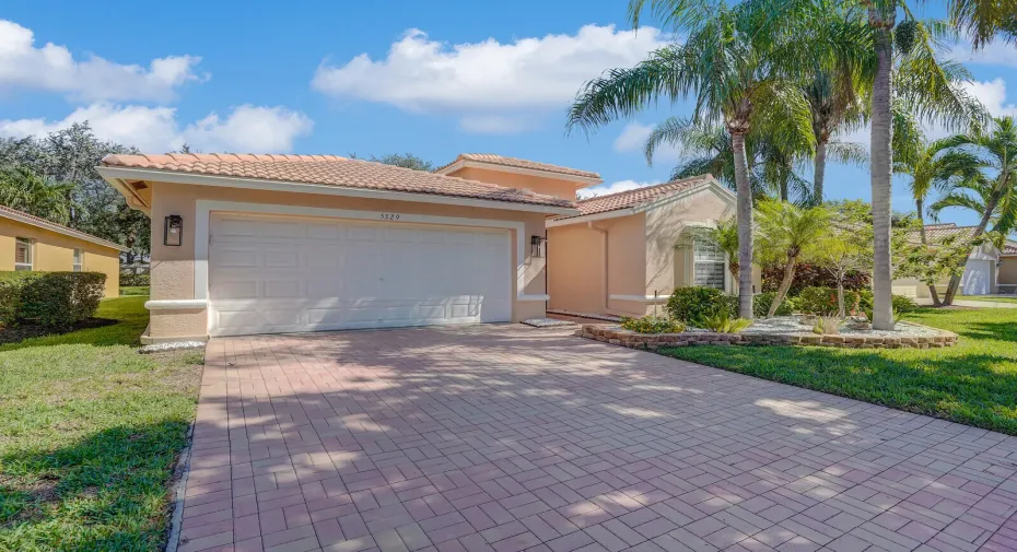 Spacious 2 Car Garage & Driveway. All Redone Front & Back Lush Landscaping.