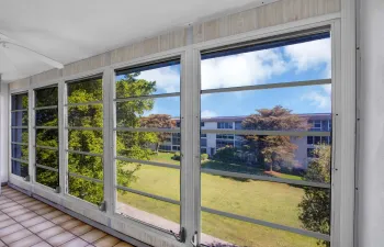 GLASS ENCLOSED PATIO