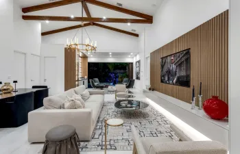 Statement great room with custom media wall and entertainer’s layout.