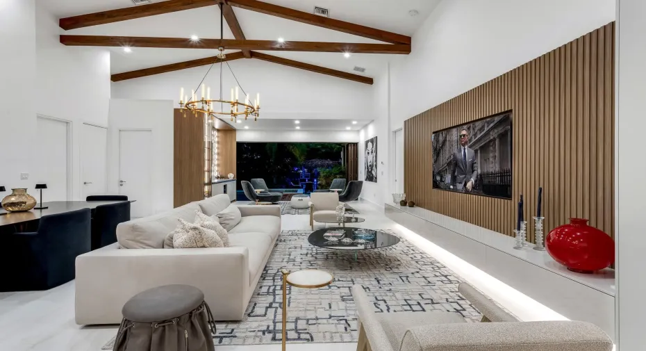 Statement great room with custom media wall and entertainer’s layout.
