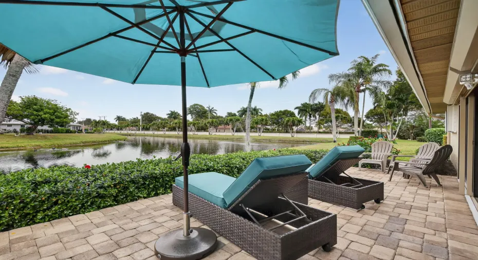 Step outside the Florida room to your outdoor living space with wide water views.