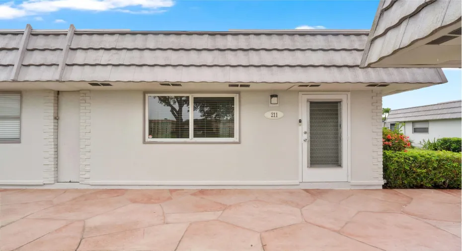 Welcome to 211 Valencia I, one of the few sections in Kings Point offering desirable single-story semi-attached villas with no upstairs neighbors. Charming curb appeal, private front entry, and beautifully maintained landscaping.