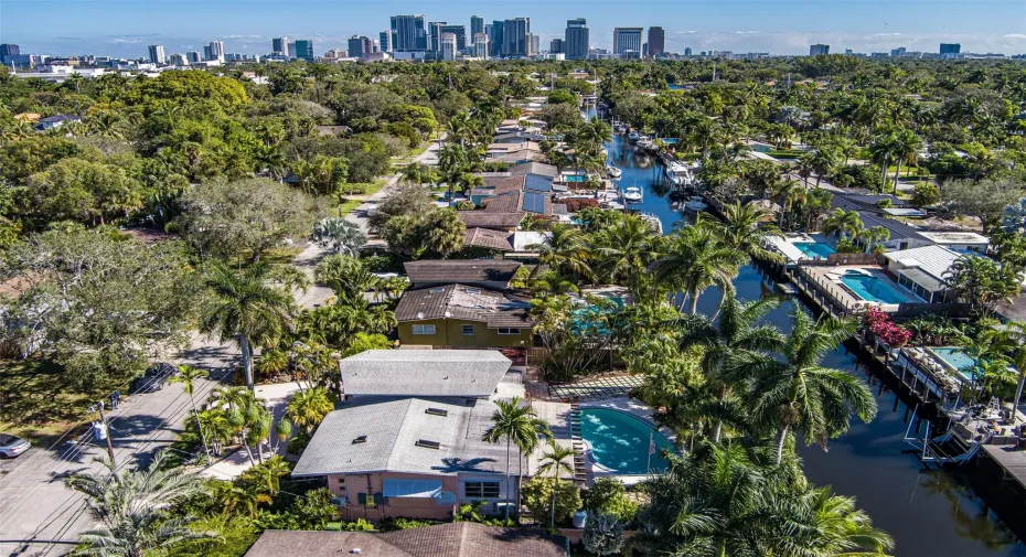 View of home with pool on canal, short distance to downtown Ft Lauderdale and no fixed bridges access to intercoastal and ocean