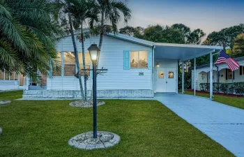 LAND OWNED, Metal Roof, 2/2 + Bonus Room. Beautifully Remodeled, freshly Painted, New Flooring.