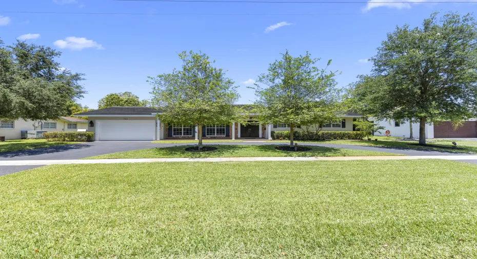 North/South facing estate home on large lot