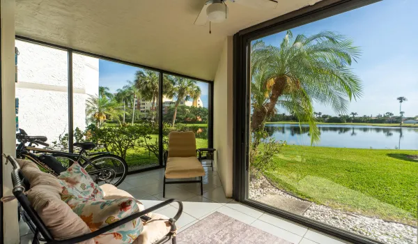WATERFRONT CORNER UNIT WITH VIEW OF GOLF COURSE.