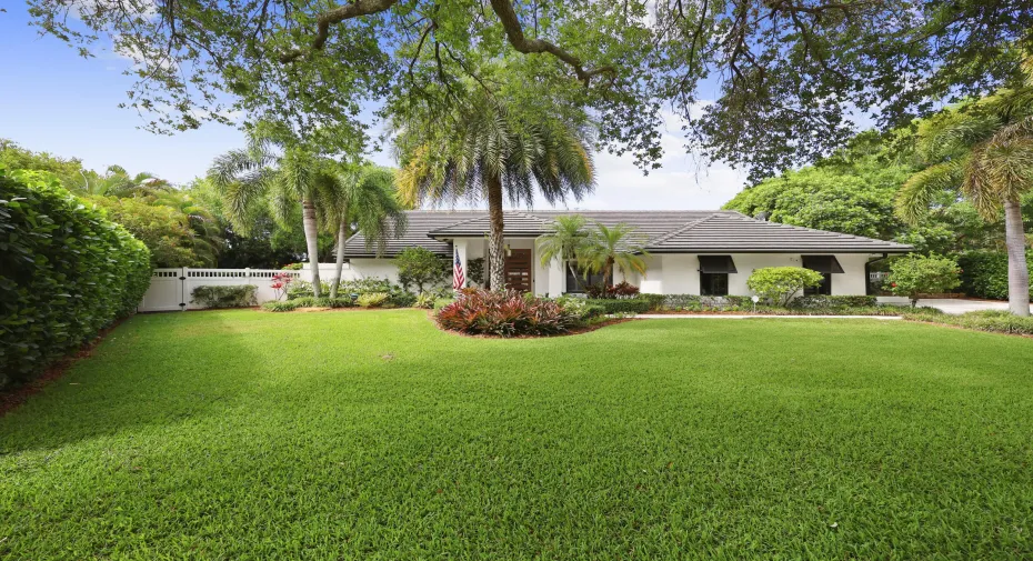 Welcome home to this beautifully updated ranch style home featuring lush tropical landscaping, an expansive front lawn, and striking curb appeal in the extremely desirable Verona Woods community.