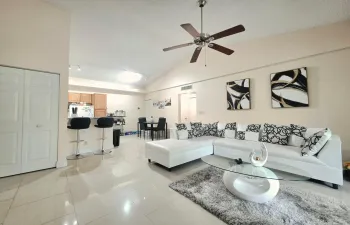 WELCOME HOME, BEAUTIFUL PORCELAIN FLOORS AND VAULTED CEILINGS