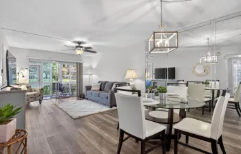 Open dining and living room with lake view