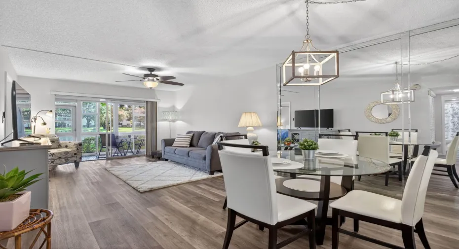 Open dining and living room with lake view