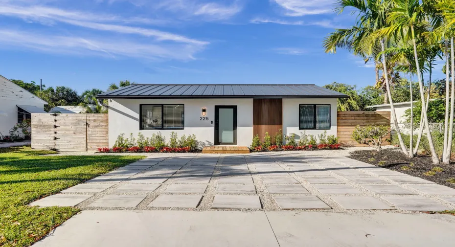 Modern Delray Beach bungalow with lush tropical landscaping and a sleek contemporary design just minutes from Atlantic Avenue and the beach.