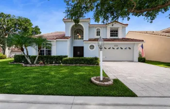 Front exterior - 2 car garage and spacious driveway