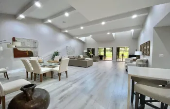 Great room contains dining room, sitting area and the enclosed linai.