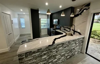 Welcome Home to your Ultra Modern, Sleek & Luxurious, completely renovated move in ready condo!