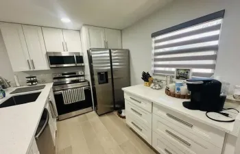1 bedroom 1 1/2 baths, 1st floor condo Fully furnished turnkey- Full renovation,SS Appliances, Enclosed patio that opens up to a large uncovered pavered Patio Overlooking a large green area.Open space living, reserved parking spot outside the front door,