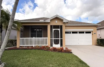 RARE Waterfront Home with a 2-car garage in the gated community of Kings Isle.