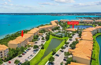 This 2nd floor condo offers a gorgeous view of the intracoastal and tons of custom upgrades