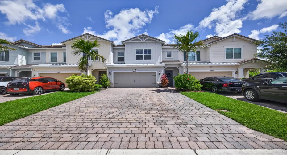 huge oversized driveway...driveway was widened to easily accommodate 4 cars in driveway and 2 in garage for 6 total