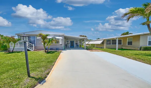 EXTERIOR FRONT - EXPANDED DRIVEWAY