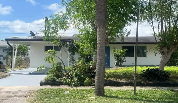 Freshly painted exterior.  One car carport.