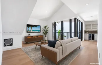Welcome to this special unit with a Loft, 17 ft. vaulted ceilings and ample light. Motorized shades for the double doors in Living Area & Kitchen.