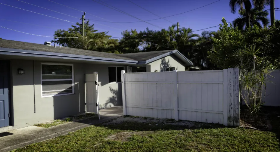 Entrance to end unit with Private Fenced Yard