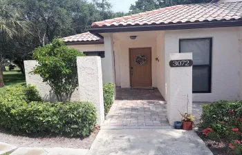 Private front entry with patio