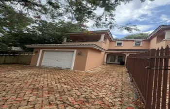 Entrance with 1 car garage and extra parking