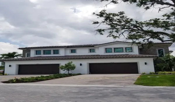 Photo is from a previously built coach home. The currently listed one is under construction.