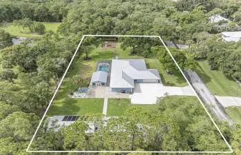 Areal photo of 1.07 Acres residence and detached 600 sq feet flex space