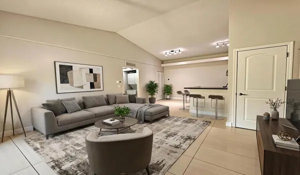 WELCOME TO YOUR NEW PLACE TO CALL HOME! TOP FLOOR WITH VAULTED CEILINGS. This photo is virtually staged.