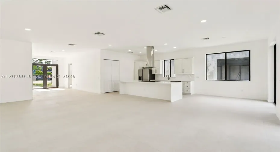 Photos shown are of a completed unit with the same layout and styling; the available unit is currently under construction and may vary.