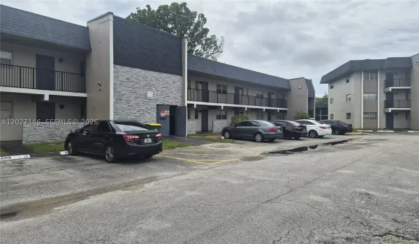 Welcome to Building 6 at Versailles Gardens, featuring assigned resident parking right at your front entrance
