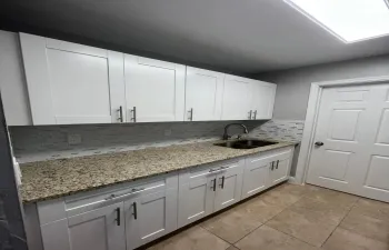 WOOD KITCHEN W/GRANITE COUNTERS