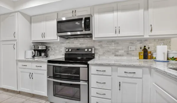 Remodeled kitchen, stainless & quartz