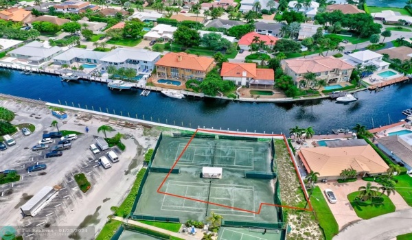 The only Single Family Home offered in the Lighthouse Point Yacht Club Development!
