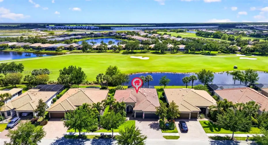 PREMIUM GOLF & LAKE FRONTAGE ON 10th HOLE OF PANTHERS RUN In Del Webb Gated Community