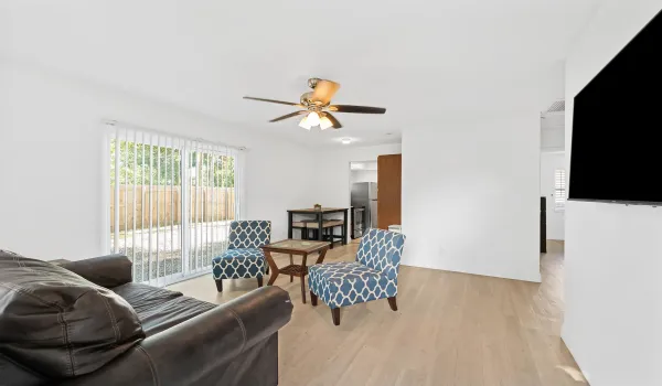 Adorable furnished or unfurnished, corner unit, access to backyard through slider